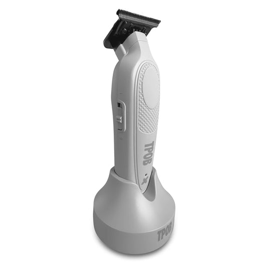 Gray and black hair trimmer on a white background