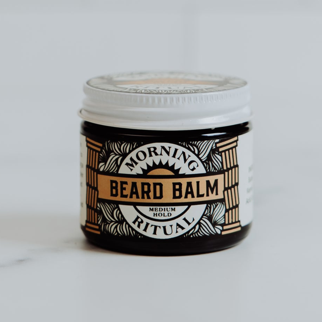 Samson's Haircare Beard Balm Original jar on a grey background straight on view of the front of the brown jar with white lid