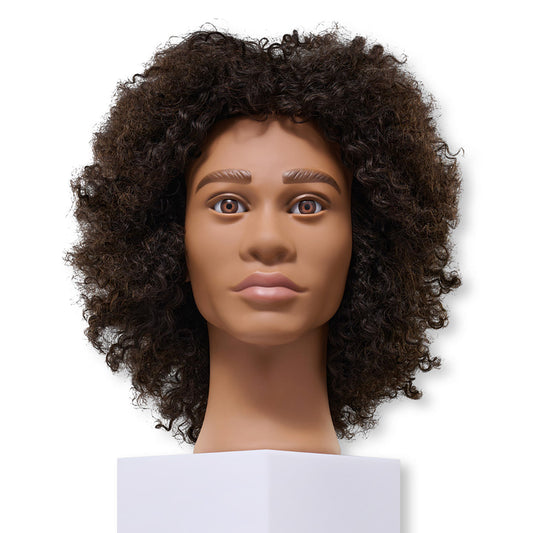 A mannequin head with medium brown skin and dark brown curly hair, displayed on a white pedestal against a plain white background.