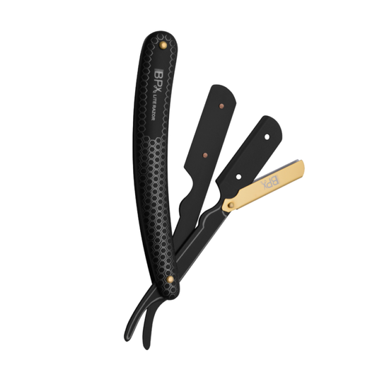 A BarPro X straight razor with a textured black handle, black blades, and a gold-toned guard, shown open against a solid white background.