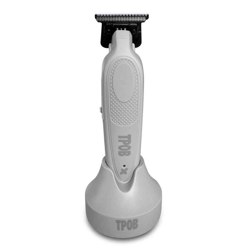 Gray hair trimmer with 'TPOB' branding on a white background