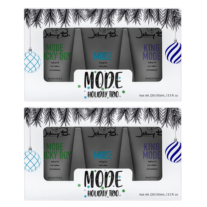 two Johnny B MODE Holiday Trio Set of mode lucy boy, mode and king mode styling gels in a holiday themed white box with clear front box view of products