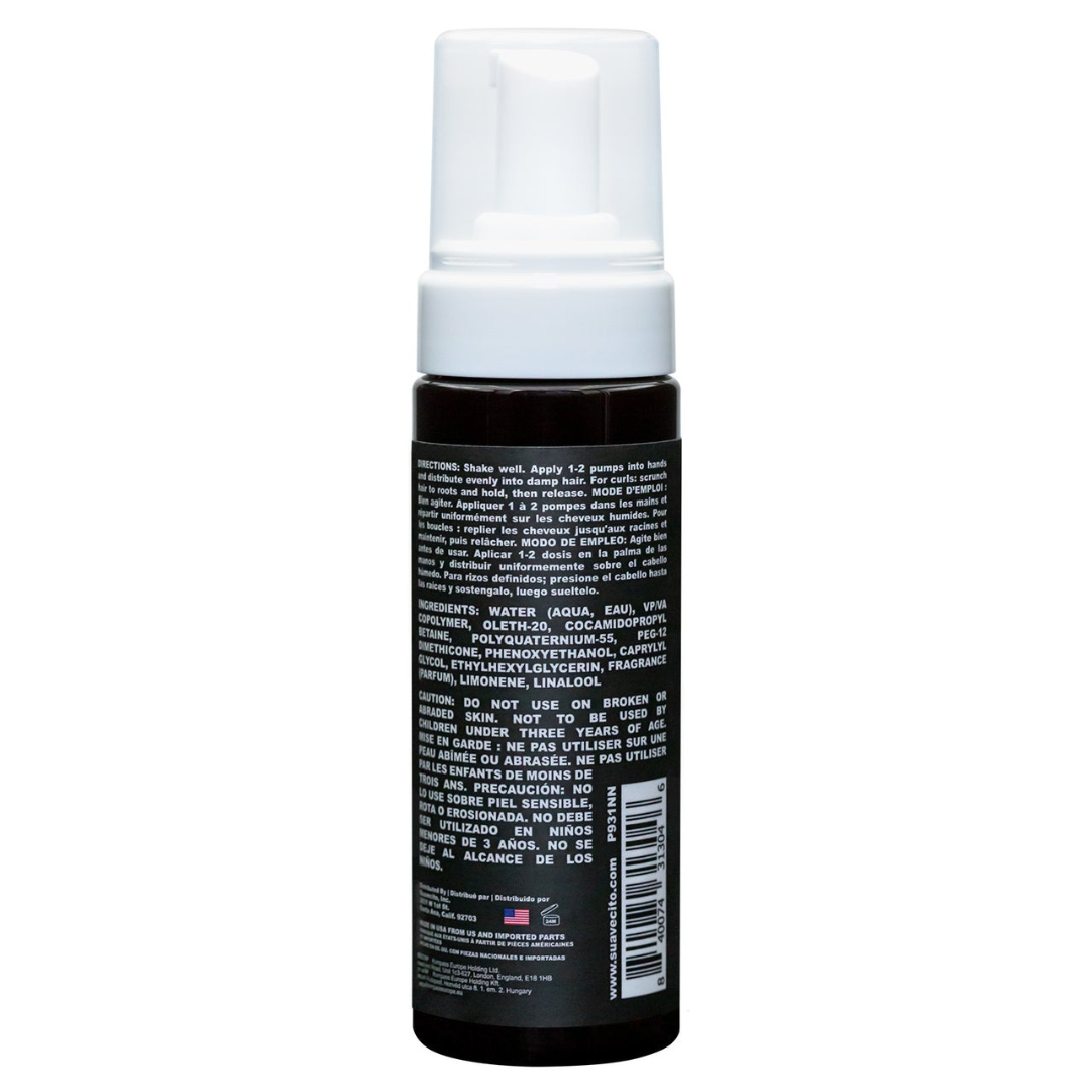 Suavecito Curl Mousse brown bottle with white pump cap on white background showing the back side of the bottle listing ingredients etc